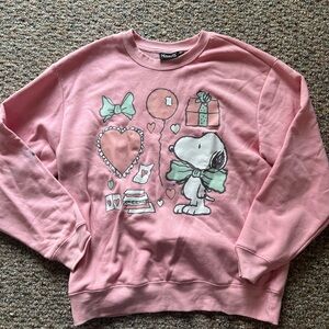 Peanuts Pink Crewneck Sweater with Cartoon Design